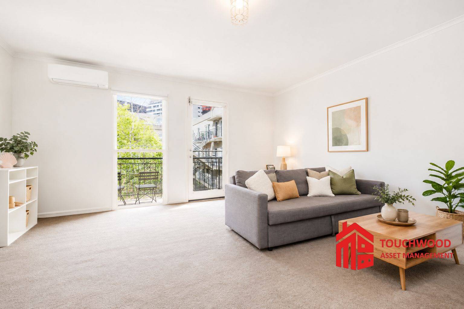 Living area opening to the balcony at 23/114 Dodds Street, Southbank