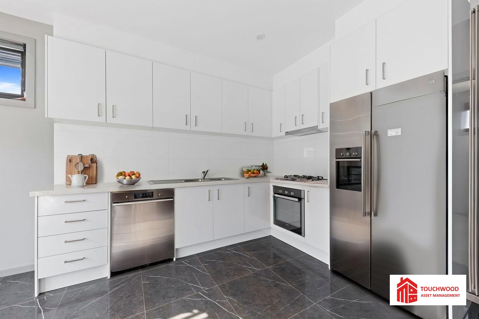 Contemporary kitchen with stainless steel appliances