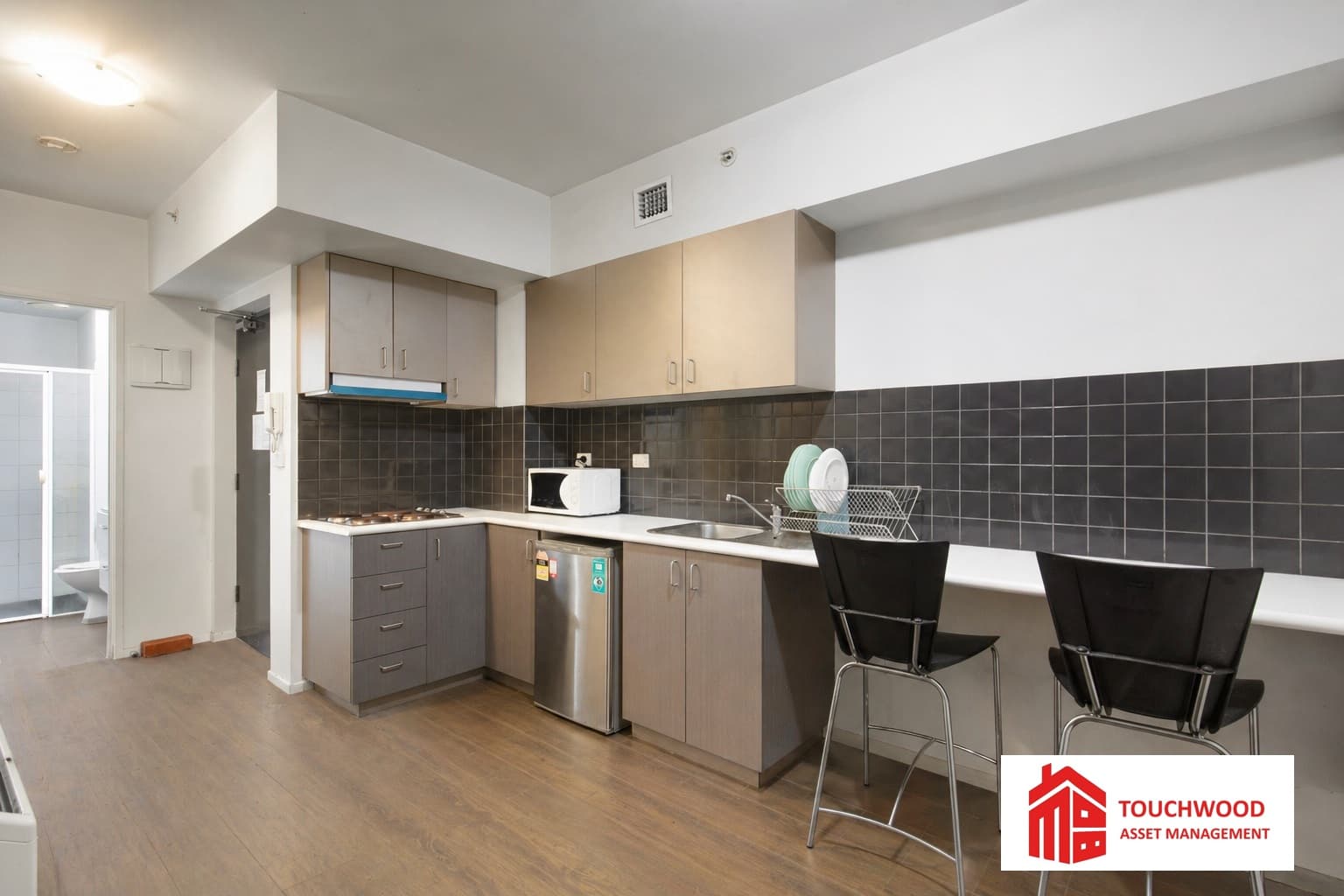 Functional kitchen with stainless steel appliances