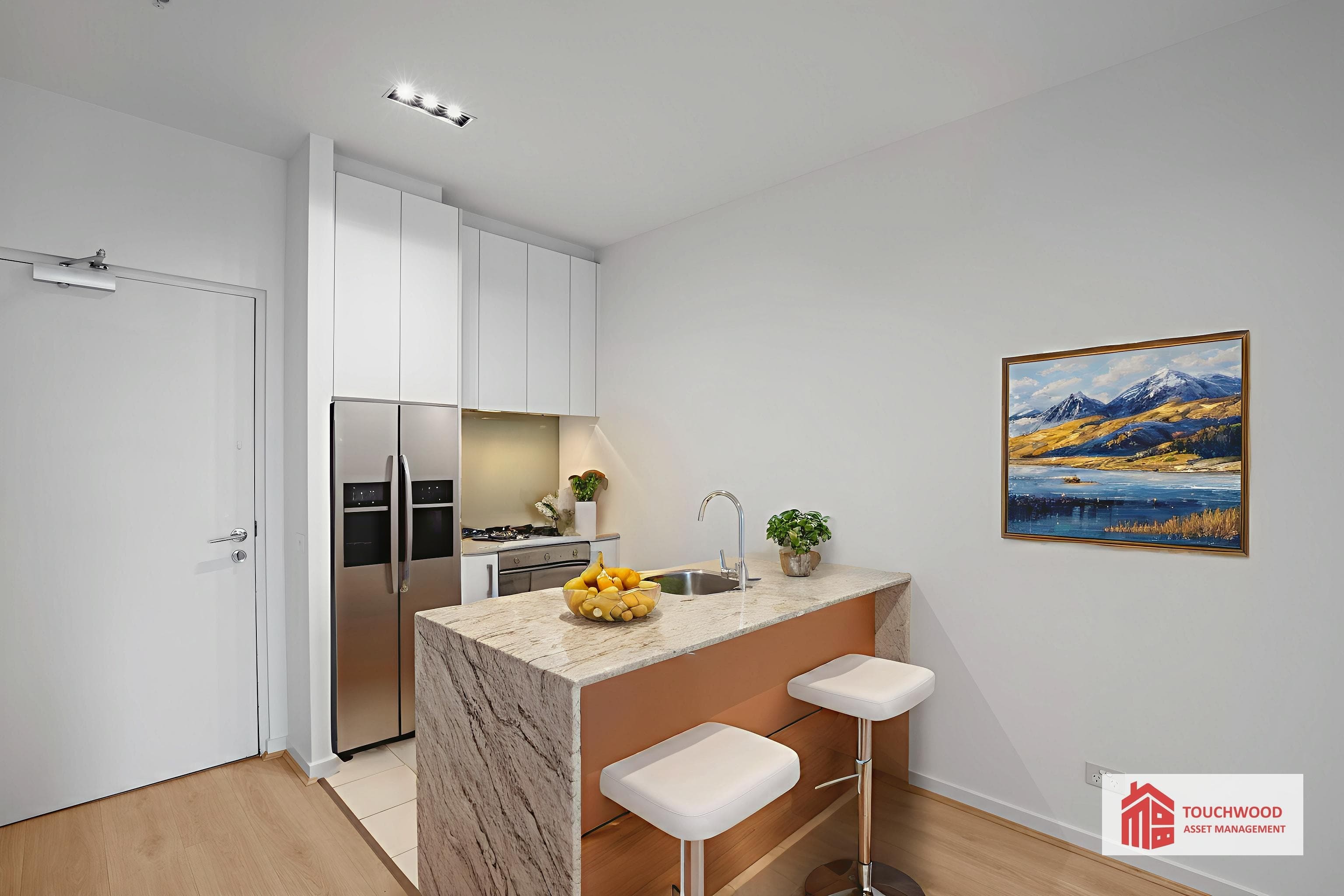 Renovated kitchen with stone finishes