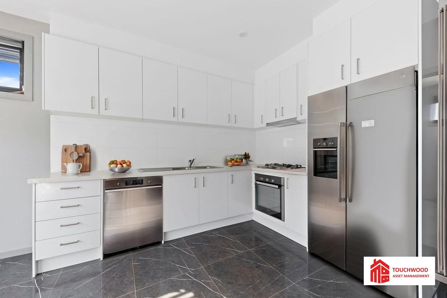 Contemporary kitchen with stainless steel appliances